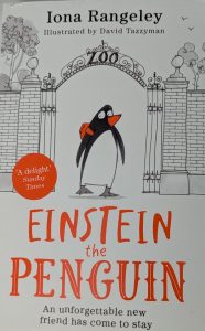 The cover of a children's novel entitled Einstein the Penguin is shown. There is a drawing of a penguin wearing a backpack in the centre of the page and he is standing in front of an open gate attached to pillars. Above the gate is a sign that says ZOO. The title is centred at the bottom in a large orange font and underneath it says An unforgettable new friend has come to stay. There is an orange circle in the left side of the penguin with white writing that says "A delight" Sunday Times. The author's name is centred at the top in black ink, Iona Rangeley. Underneath her name it says Illustrated by David Tazzyman.