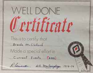 A photograph of a Well Done Certificate is shown from 1978-79. Brenda McClelland was completed 200 Current Events.